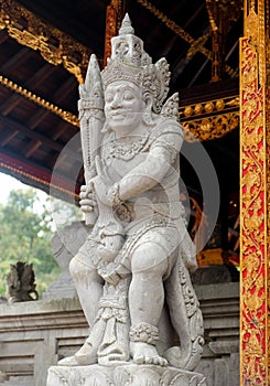 Decorated statue of traditional hindu god, at Ganung Kawi Temple, Bali photo