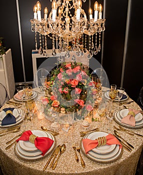 Decorated table with plates and serviettes
