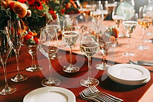 Decorated table setting with champagne glasses