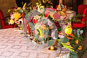 Decorated table, vases of flowers. Close up. Wedding concept