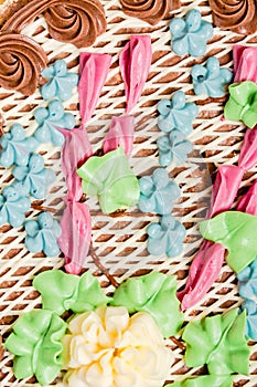 Decorated top of Kiev cake background. The known ukrainian bakery products . Close-up .view. It is a dessert cake, made in Kiev,