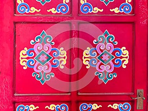 Decorated traditional Chinese home red door