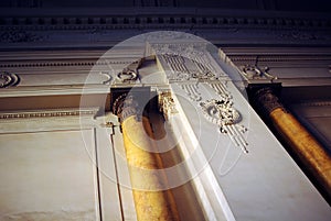 Decorated wall with antique marble columns