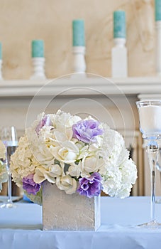 Decorated wedding table with flowers and candles