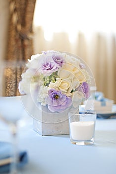 Decorated wedding table with flowers and candles