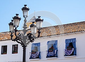 Decorated windows face Plaza de los Naranjos in Marbella photo