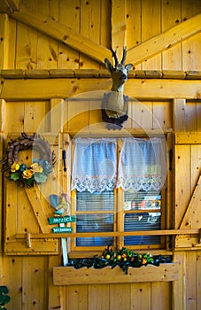 Decorated wood façade at Pass Pordoi Dolomites Sella group, Italy