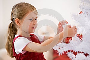 Decorating a christmastree photo