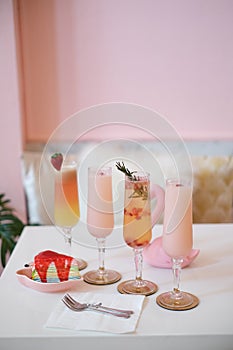 Decorating the dining table with dessert and drinks