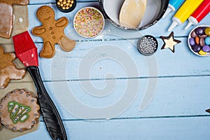 Decorating of gingerbread man Christmas cookie