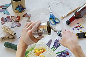 Decorating a tin can. Creation