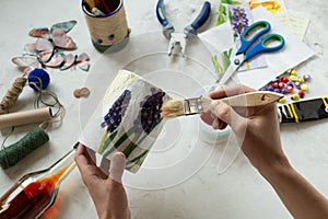 Decorating a tin can. Creation