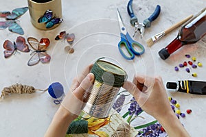 Decorating a tin can. Creation