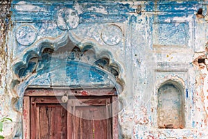 Decoration above a door of an old house in Orchha