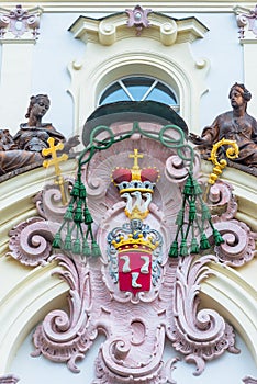 Decoration above the main entrance to the Archbishop palace in Prague photo