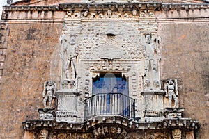 Decoration of Casa de Montejo in Merida, Mexico. Triumphant conquistadors staying on heads of barbar