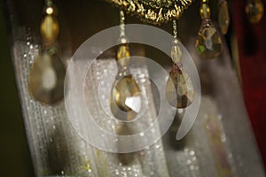 The decoration on the curtains is in the form of gemstone