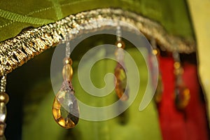 The decoration on the curtains is in the form of gemstone