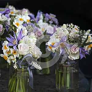 Decoration of dining table. bouquet of white narcissus in vase o