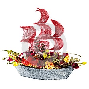 Decoration flowers ship with crimson sails