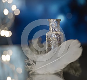 decoration glass bottle white pen blue bokeh background