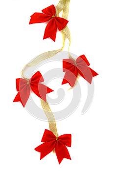 Decoration, gold ribbon with red bow
