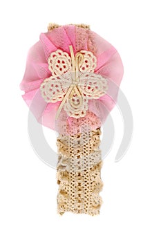 Decoration for the head with pink flower.