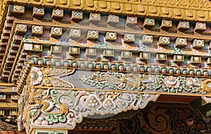 Decoration on a historic building at the Boudhanath stupa in Kathmandu