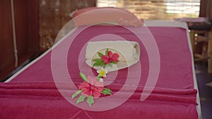 A decoration on a massage bed in a tropical resort