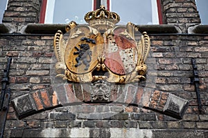 Decoration on old houses of Bruges, Belgium