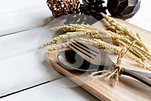 Decoration Seasonal table setting with wooden spoon and fork