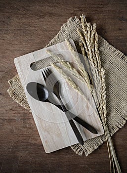 Decoration Seasonal table setting with wooden spoon and fork on