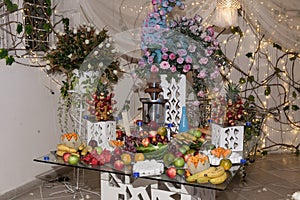 Decoration of social events; Individual dessert table for the guests at the wedding reception