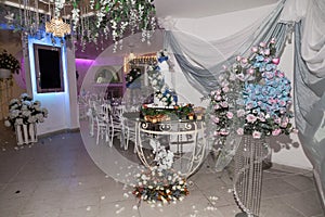 Decoration of social events; Individual dessert table for the guests at the wedding reception