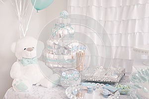 Decoration. Cute diaper cake for a baby shower party photo