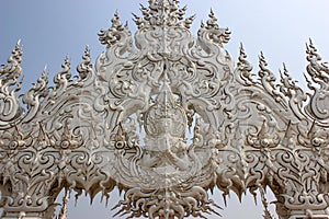 Decoration at Wat Rong Khun or White Temple, a contemporary unconventional Buddhist temple in Chiangrai, Thailand, was designed b photo