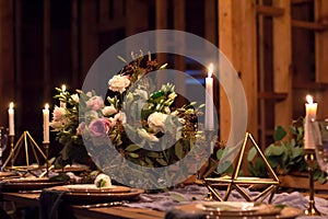 Decoration wedding table before a banquet in wooden barn.