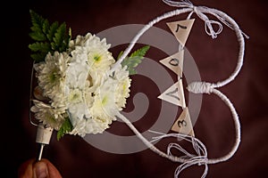 Decoration from white flowers and words LOVE