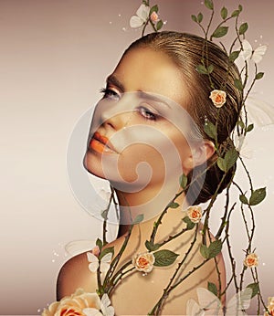 Decoration. Young Sensual Woman with Flowers