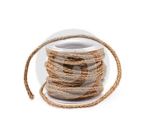 Decorational rope string on a bobbin