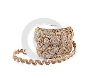 Decorational rope string on a bobbin