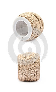Decorational rope string on a bobbin