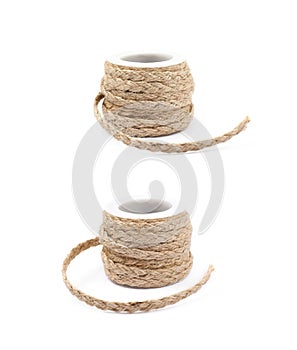Decorational rope string on a bobbin