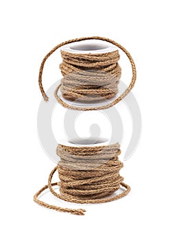Decorational rope string on a bobbin