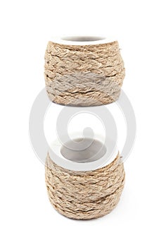 Decorational rope string on a bobbin