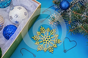 Decorations for Christmas in a box, snowflake, tree and hooks