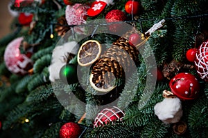 Decorations on Christmas tree. Christmas decor. Details.Christmas tree decorations homes.