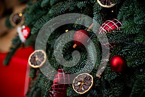 Decorations on Christmas tree. Christmas decor. Details.Christmas tree decorations homes.