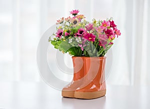 Decorations for garden. boots with flowers