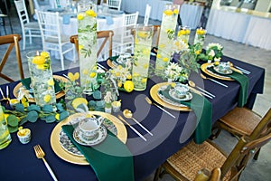 decorations made of wood and wildflowers served on the festive table